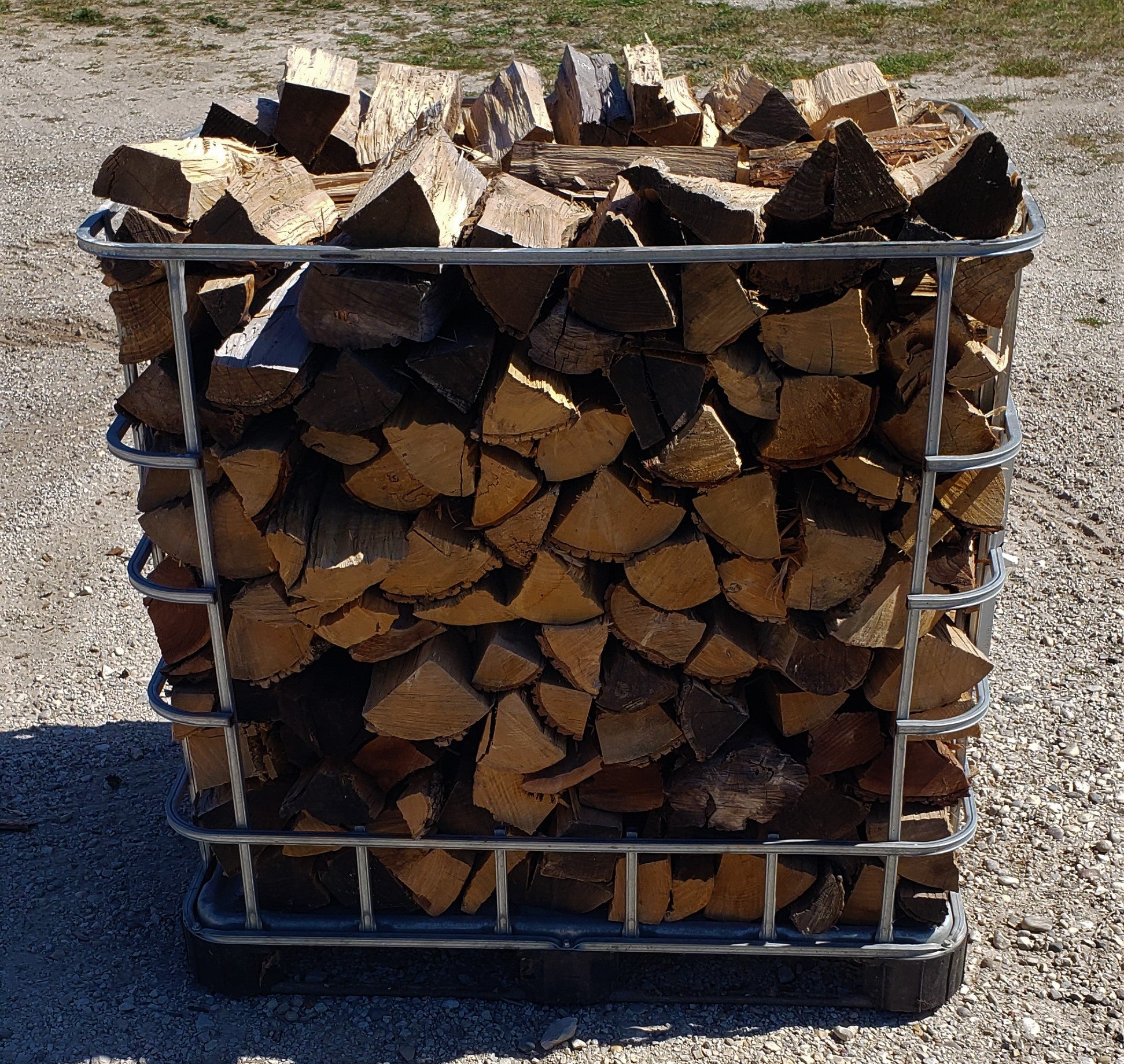 Front view of double stack firewood crate outside in the sunshine