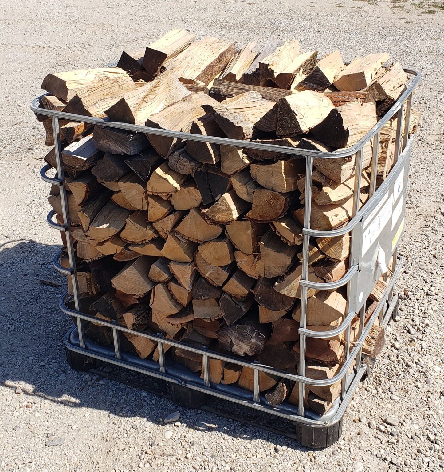 Front angle view of double stack firewood crate outside in the sun
