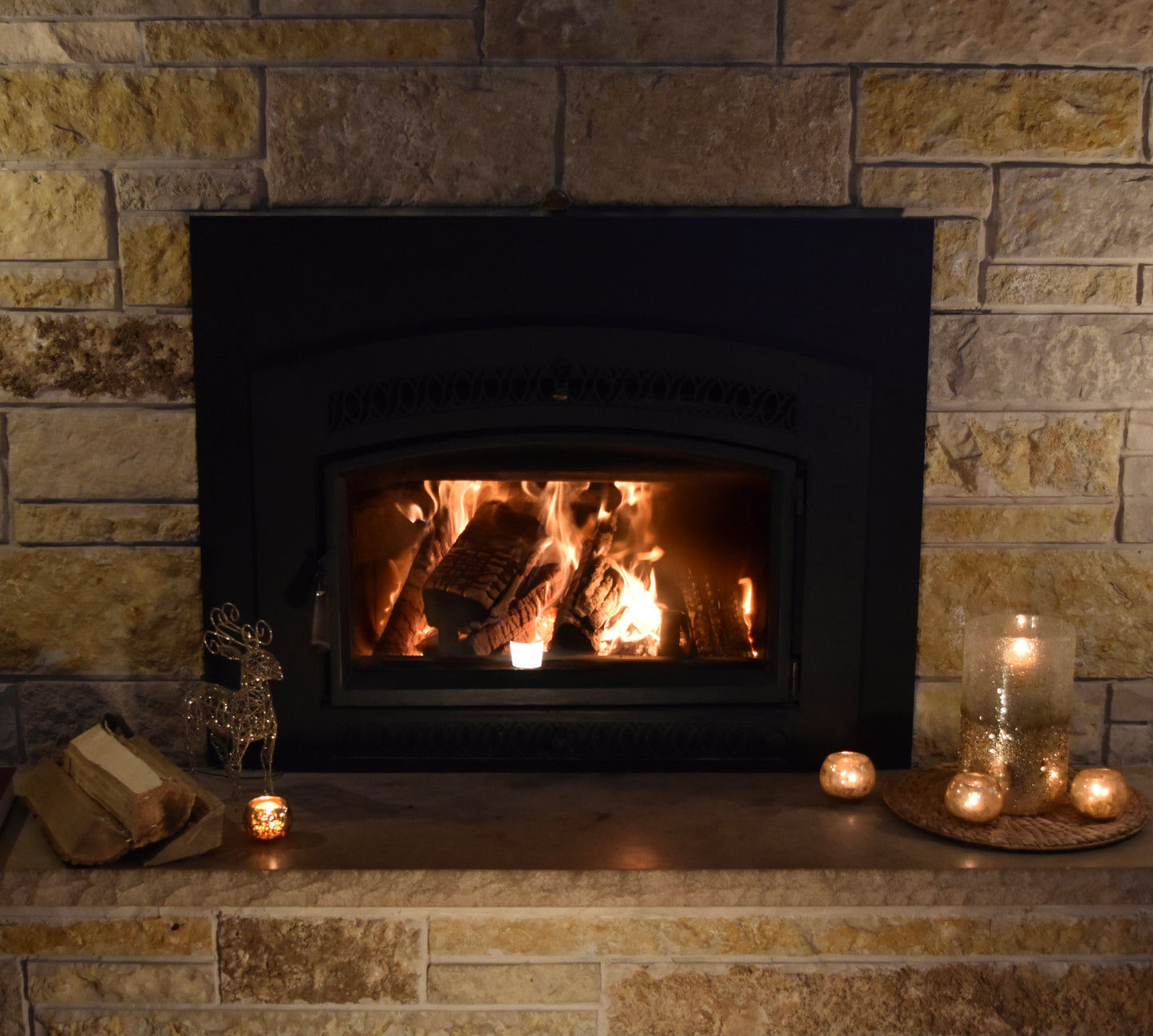 Burning wood indoors in a woodstove fireplace